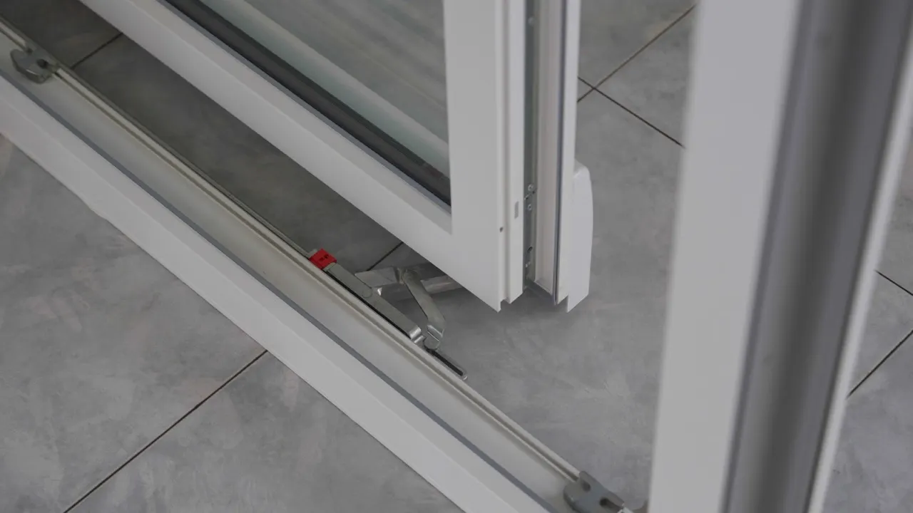 Floor track of a uPVC tilt-slide door