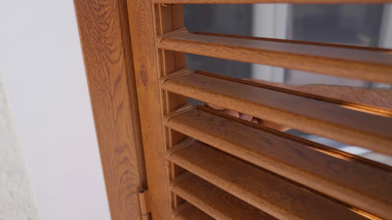 Close-up of the slats of a wood-effect shutter