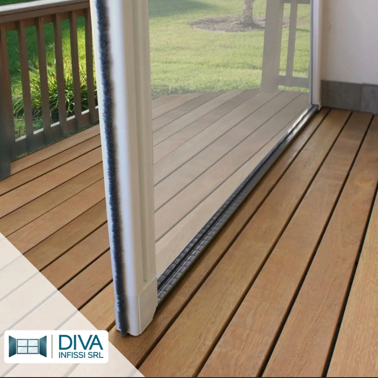Flush floor threshold of a sliding French door onto a wooden deck
